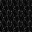 Abstract background with black and white circles.