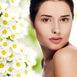 Portrait of young beautiful woman with healthy skin