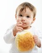 Photo: Baby eating bun bread Baby eating bun bread