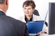 Boss talking to candidates