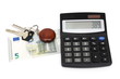 concept of cost of living with calculator,money,keys