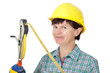 Foto: Construction worker with a tape measure Construction worker with a tape measure
