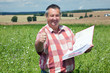 Foto: Agricultural engineer at the field inspection Agricultural engineer at the field inspection