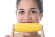 Model Released. Young Woman Eating Corn on the Cob