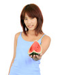 young asian woman with a piece of red watermelon