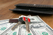 house keys and dollars