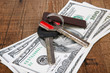 house keys and dollars