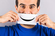Young Man with Smiley Emoticon