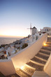 Photo: Windmill in Santorini against sunset, Greece Windmill in Santorini against sunset, Greece