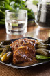 Pork loin with mushroom sauce. Dark light