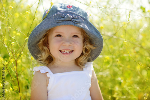 Photo: toddler in rape field toddler in rape field
