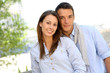 Cheerful couple relaxing in park
