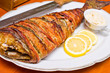 Fish wrapped in bacon