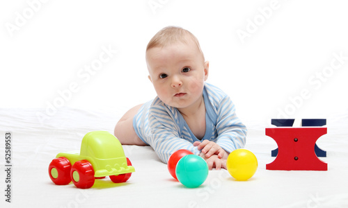 Photo: Beautiful baby playing with toys Beautiful baby playing with toys