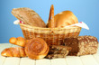 Composition with bread and rolls, in wicker basket