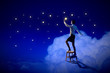 Woman lighting stars