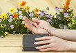 Prayer over old Holy Bible. Wooden background.