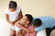 Overhead View Of Children Giving Father Gift