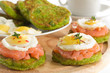 Snack of pancakes with fish and egg.