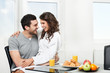 beautiful couple having breakfast