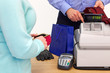 Woman buying gifts for a man