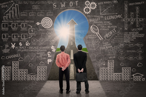 Photo: Business partner look at marketing success concept Business partner look at marketing success concept