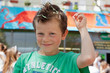 Foto: Carnaval : fil serpentin dans les cheveux Carnaval : fil serpentin dans les cheveux