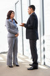Photo: Businesspeople Having Informal Meeting In Office Businesspeople Having Informal Meeting In Office