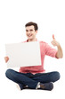 Photo: Guy with blank sign showing thumbs up Guy with blank sign showing thumbs up