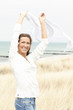 Woman enjoying sea breeze