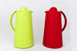 green and red plastic water jug