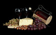 Wine bottle with  grapes and cheese