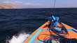 The boat floats in the high sea. Indonesia.