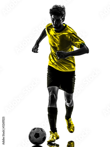 Photo: brazilian soccer football player young man silhouette brazilian soccer football player young man silhouette