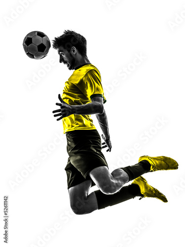 Photo: brazilian soccer football player young man heading silhouette brazilian soccer football player young man heading silhouette