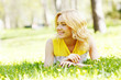 Photo: Woman lying on grass Woman lying on grass
