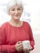 Smiling senior woman with tea