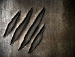 Photo: claws scratches marks on rusty metal plate claws scratches marks on rusty metal plate