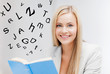 young woman reading book