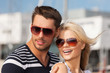 happy young couple in port