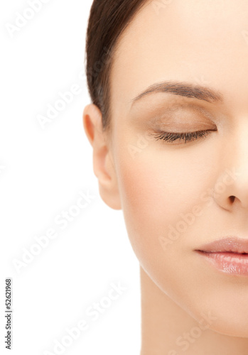 Photo: half face of beautiful woman half face of beautiful woman