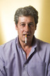 man with a cigarette in his mouth
