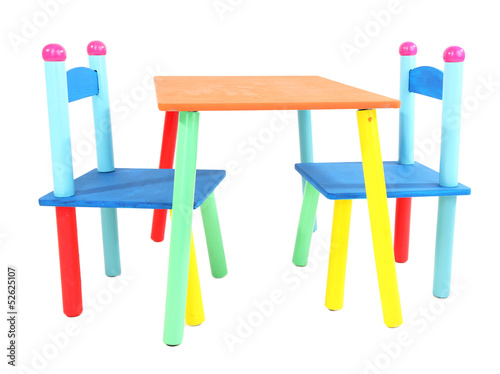 Photo: Small and colorful table and chairs for little kids isolated Small and colorful table and chairs for little kids isolated