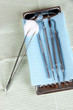 Photo: Dentist tools on napkin close-up Dentist tools on napkin close-up