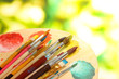 Many brush in paint close-up