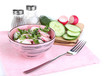 Vitamin vegetable salad in bowl with ingredients isolated