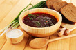 Delicious borsch on table close-up