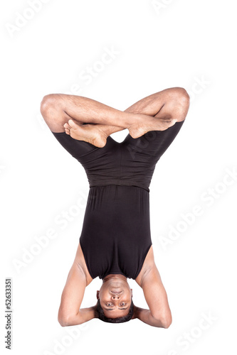Photo: Yoga by Indian man on white Yoga by Indian man on white