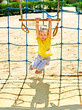 Children move out to slide in playground