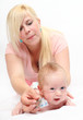 Photo: Young mother with her baby together. Young mother with her baby together.